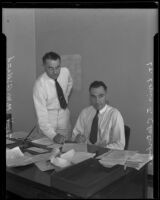 Capt. Morris W. Gilland and Lt. Louis J. Claterbos, Army engineers assisting with a flood control program, Los Angeles, 1935