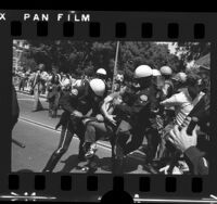 Police subduing protester during anti-war demonstration at UCLA, 1972