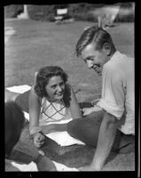 Babs Culbertson and Jack Cochran relax after a game of tennis, Santa Barbara, 1936