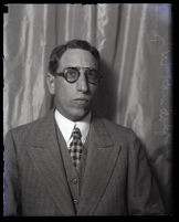 Portrait of J. W. Randolph in front of a curtain, Los Angeles, 1929