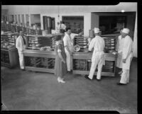 Los Angeles County General Hospital kitchen staff line up food delivery carts, Los Angeles, [1934]