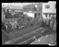 California Shipbuilding yard workers at phony launch of cardboard ship S.S. Absentee, 1943