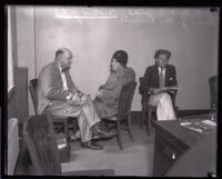 Dr. W. C. Judd, Carolina Judd, and Burton J. McKinnell during questioning at the police station, Los Angeles, 1931