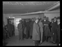 Men gathered inside of the Oregon police station where kidnapper and murderer William Edward Hickman was held, Pendleton, 1927