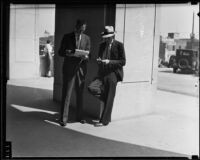 Deputy Sheriff H. A. Llwellyn and Burdette Daniels at the Sherrif's Sale, Los Angeles, 1935