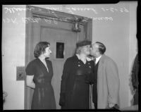 Officer Betty Relyea watches as Vera Shuvalova and her husband Stan Laurel kiss, Beverly Hills, 1939