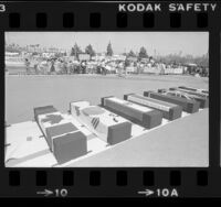 People gathered near flag-draped coffins protesting the downing of Korean Air Lines Flight 007, 1983