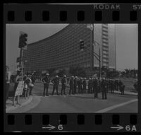 Police and Protesters await President Johnson's arrival at Century Plaza. 1967