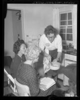 Julia Child in cooking demonstration, 1961