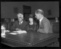 Joseph Scott in a courtroom with a woman (client?) and a man, Los Angeles, 1930s