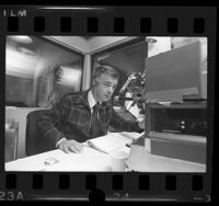 Radio talk show host, Michael Jackson at work in KABC studio in Los Angeles, Calif., 1974