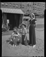 Debutantes Pat Richards, Dorothy Walsh, and Janet Hubbard at the beach, Los Angeles, 1936