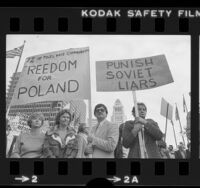 Polish Americans carrying signs, one reading "Punish Soviet Liars" during protest in Los Angeles, Calif., 1981