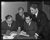 Joseph B. Keenan, Ernest R. Utley, Peirson Hall, and William Fleet Palmer discuss upcoming trial, Los Angeles, 1934-1935