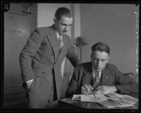 Dr. Benjamin Blank and Sergeant Howard L. Barlow analyze the fingerprints of William Edward Hickman, Los Angeles, 1928