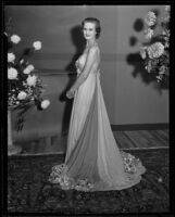 Actress Louise Brien models a white dress at a Times' fashion show, Los Angeles, 1935