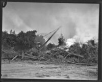 Workmen clearing flood debris following the failure of the Saint Francis Dam and the resulting flood, Santa Clara River Valley (Calif.), 1928