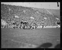 Football game between the UCLA Bruins and the St. Mary's Gaels at the Coliseum, Los Angeles, 1931