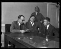 Dr. Martin G. Carter and Judge Walter S. Gates study the case of 7-year-old Alsa Thompson, Los Angeles, 1925