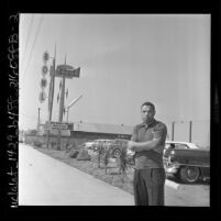 Woodley Lewis outside his Sportsman's Bowl bowling alley in Los Angeles, Calif., 1962