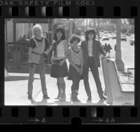 Los Angeles based music group, The Bangles, posing on street in Los Angeles, Calif., 1984