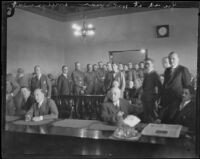 Officers stand guard at the arraignment of William Edward Hickman, kidnapper and murderer,Los Angeles, 1927