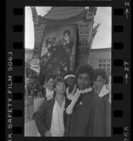 Fans of the musician Prince, imitating his look, at premiere of motion picture "Purple Rain" in Los Angeles, Calif., 1984