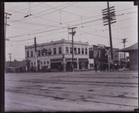 Corner of a commercial street after a fire, Los Angeles, 1920s