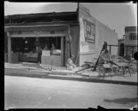 Reconstruction work on the G. V. Tucknott fruit and vegetable store building after the Long Beach earthquake, Southern California, 1933