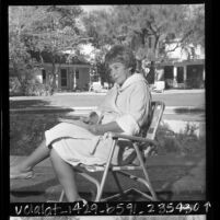 Aileen Eaton, boxing promoter, relaxing at home in Los Angeles, Calif., 1967