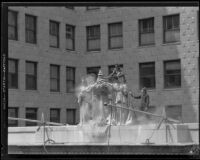 Pacific Mutual Insurance Company crest at the building entrance, Los Angeles, 1920-1939