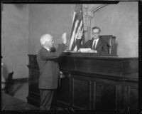 Judge Charles D. Ballard being sworn in by R.F. McClellan, Los Angeles County, 1931