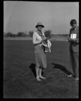 Golfer Anna R. Trabue and unidentified man, 1924-1929 (?)
