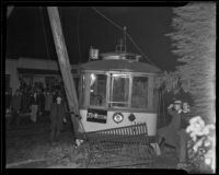 Derailed street car crashes into trolley post, Los Angeles, 1934