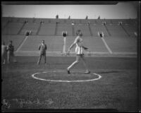 Glenn "Tiny" Hartranft participating in the discus throw at the Coliseum, Los Angeles, 1922-1927