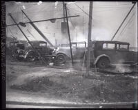 Fire-damaged cars at an auto show, Los Angeles, 1929