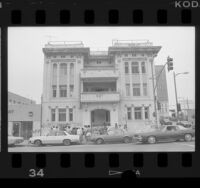 People out front of apartment building at 801 S. Union Avenue, deemed substandard in Los Angeles, Calif., 1986