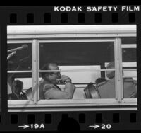 Los Angeles Superior Court Judge Paul Egly seen through a school bus window during tour of Los Angeles schools, 1980