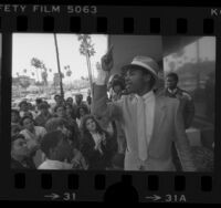 Bernard Walker speaking to demonstrators outside South African Consulate in Beverly Hills, Calif., 1985