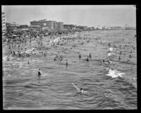 Crowd celebrating the Fouth of July on Ocean Park Beach, Santa Monica, 1929