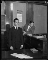 Deputy Sheriff W. A. Bennett with alleged murderer Louis Rude Payne, Los Angeles, 1934