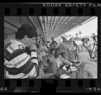 Los Angeles Express player Steve Young talking with reporters in Los Angeles, Calif., 1985