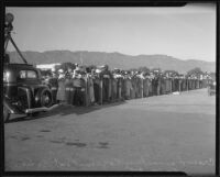 Mourners attending the arrival of the bodies of Will Rogers and Wiley Post at Union Air Terminal, Burbank, 1935