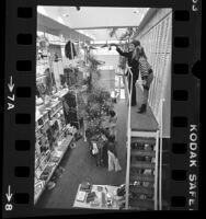 Donald J. Pliner with his wife Lois in his store on Rodeo Drive, Beverly Hills, Calif., 1976