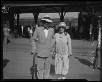 Dr. Frank Dyer and wife at train station, Los Angeles, 1920-1939