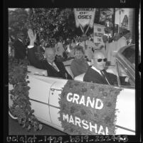 Dwight D. Eisenhower and wife, Mamie as Grand Marshal of 75th annual Tournament of Roses parade, 1964