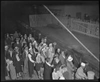 Passengers of the Harvard passenger liner arriving at the Los Angeles harbor, 1931