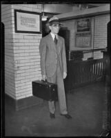 Leslie B. Henry standing outside of deputy jailer's work space, 1930s