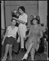 Pauline Spinner teaching Marion Harley and Ethel Churchill about styling hair, Los Angeles, 1935