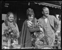 Reverend Paul Rader with Aimee Semple McPherson and Roberta Semple as they depart on their journey abroad, Los Angeles, 1926